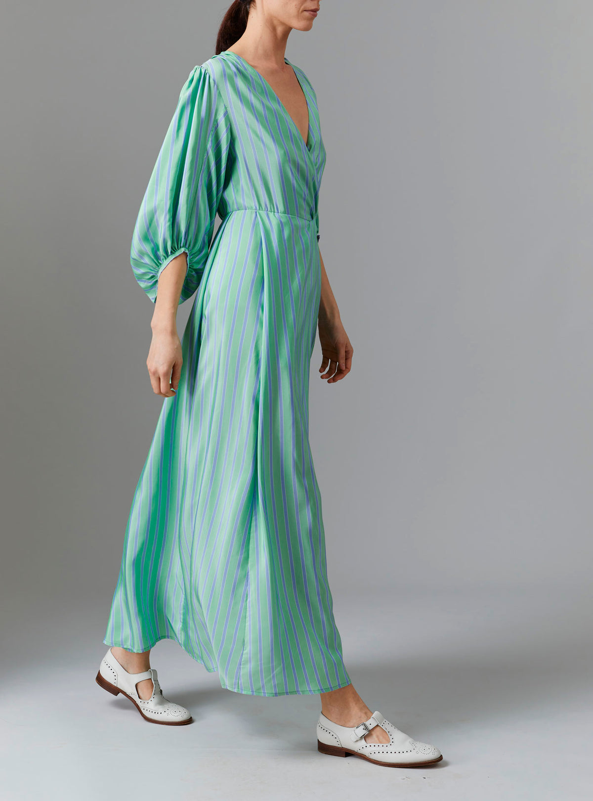 Side view of Phoebe Long Dress - Silk Road Stripes in Green/Blue | Thierry Colson Fall 2024 Collection