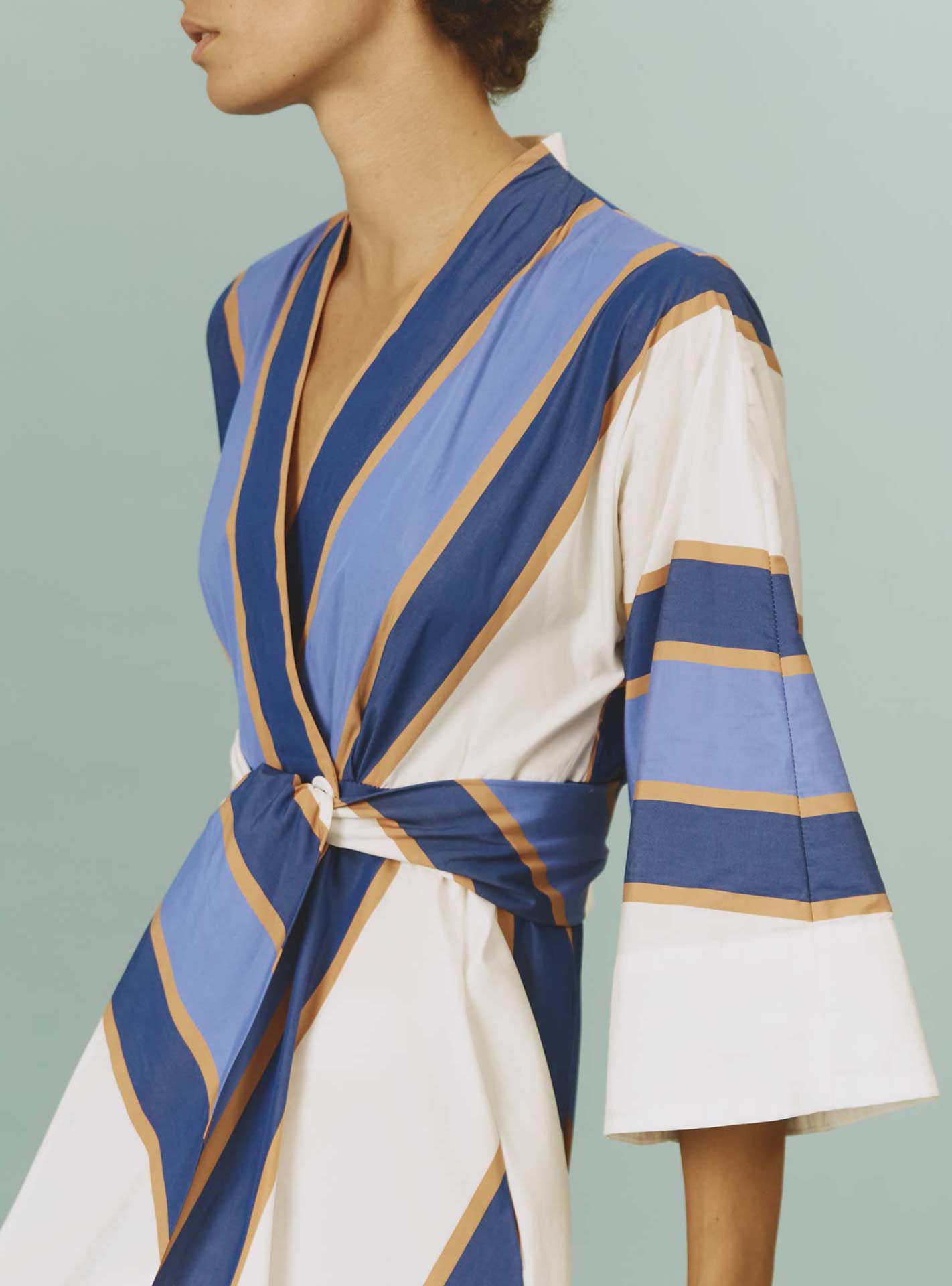 Almudena dress, detail of the neckline: Samarkand Stripes - Blue/Arancio by Thierry Colson | Spring/Summer 2024