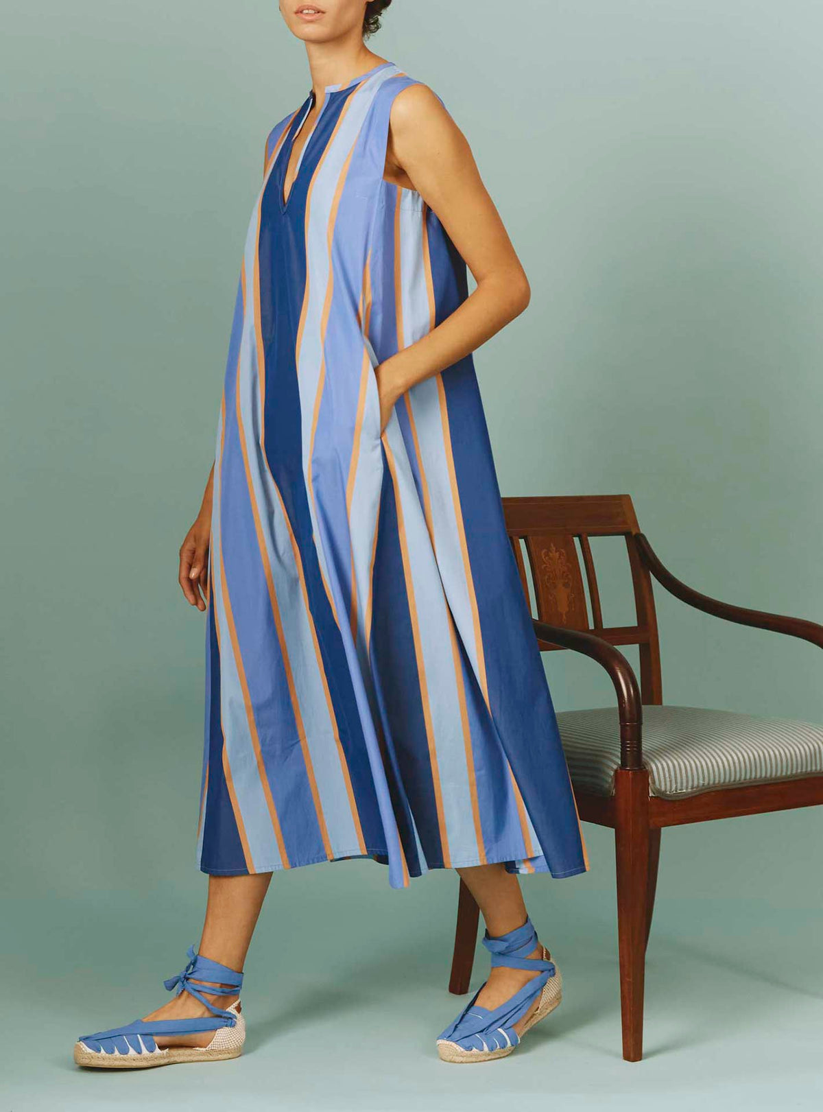 Side view of Apolonia Kaftan: Samarkand Stripes - Blue/Arancio | Spring/Summer 2024 by Thierry Colson