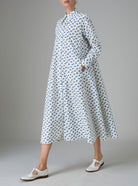 Side view of Alceste Shirt Dress Hand Block-Printed Delft Blue Kaftan Style by Thierry Colson