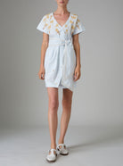 Front view of BB dress in cabbage white poplin with hand-embroidered gingerbread and honey tones by Thierry Colson