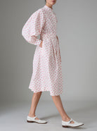 Side view of Yvonne Midi Dress Stuart-Inspired Sleeves Cottage Print Old Rose Hue by Thierry Colson