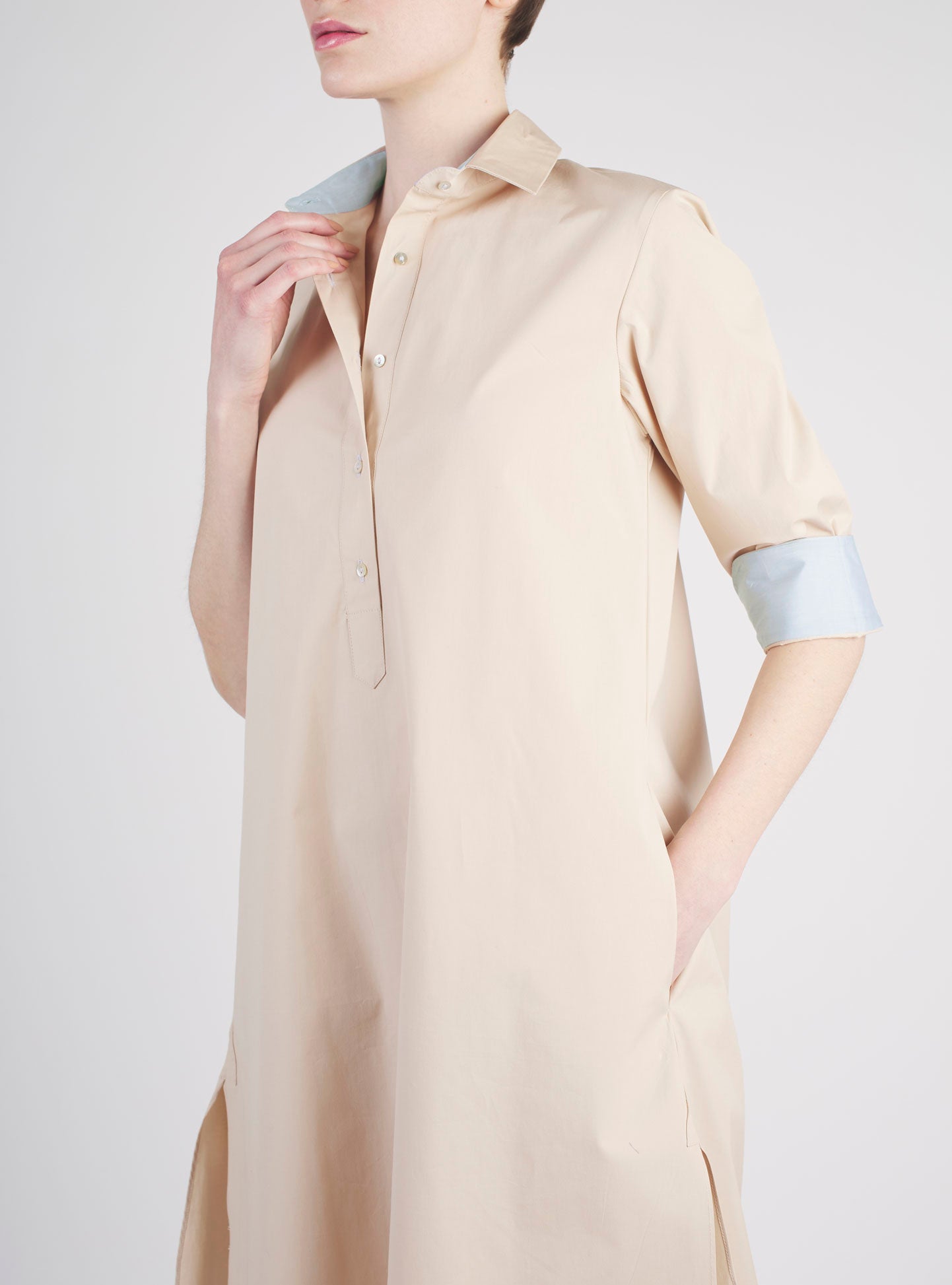 Close-up of Angelica beige shirt dress by Thierry Colson