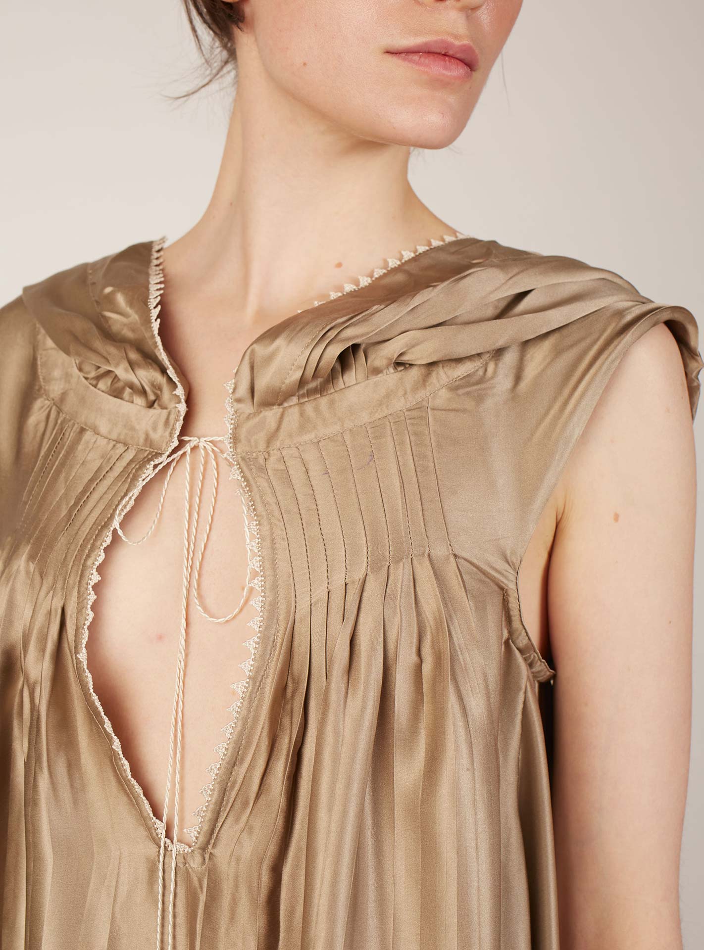 Detail front view Eden Champagne Silk Kaftan by Thierry Colson