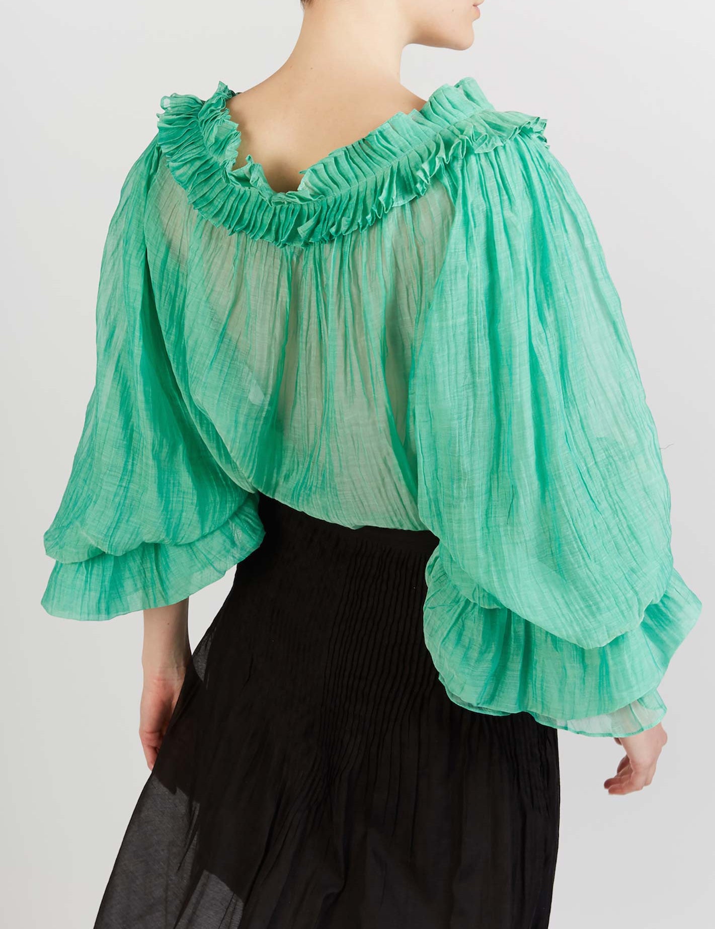 Back view of Roussia Veridian Green Blouse by Thierry Colson photographed by Stéphane Gautronneau