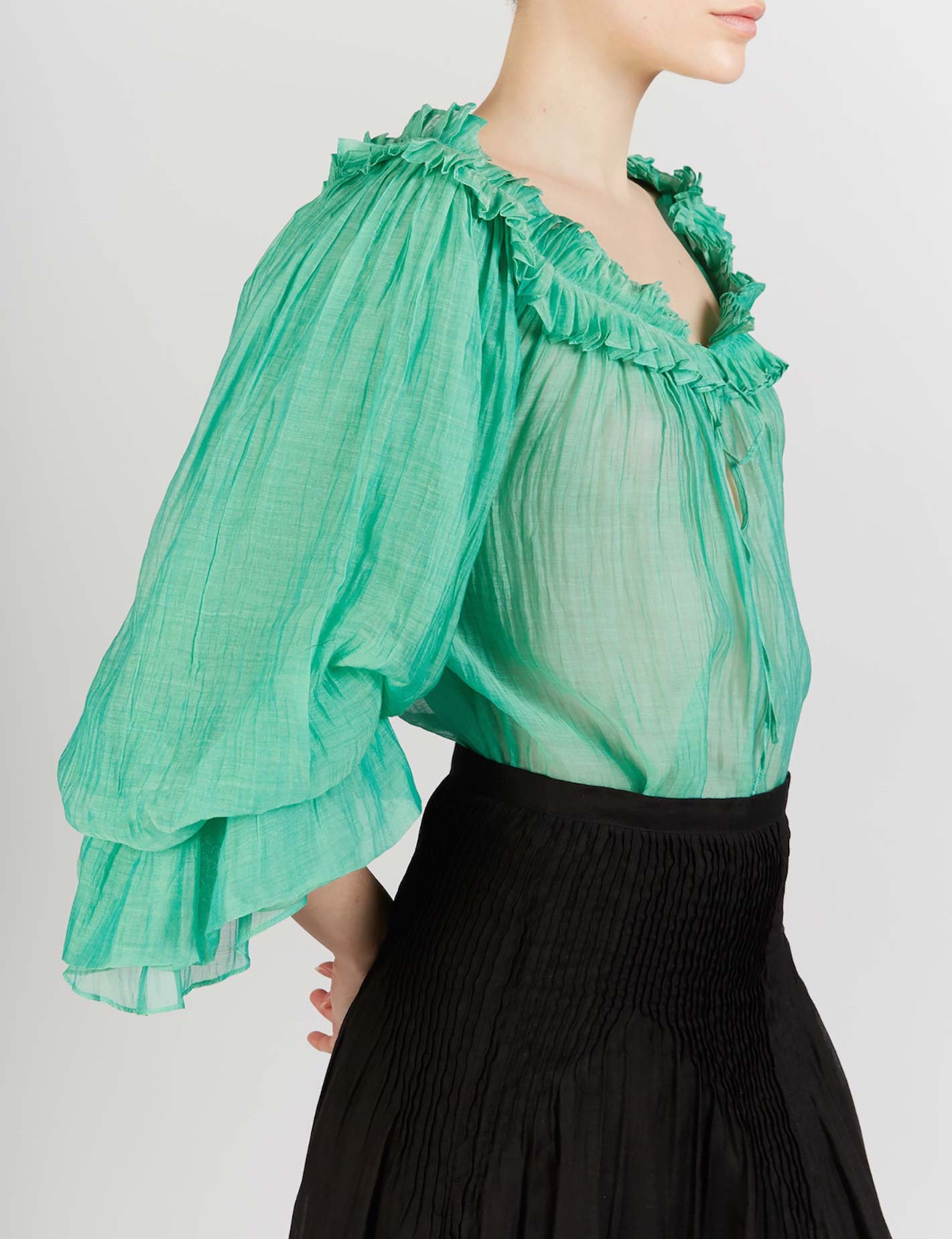 Side view of Roussia Veridian Green Blouse by Thierry Colson