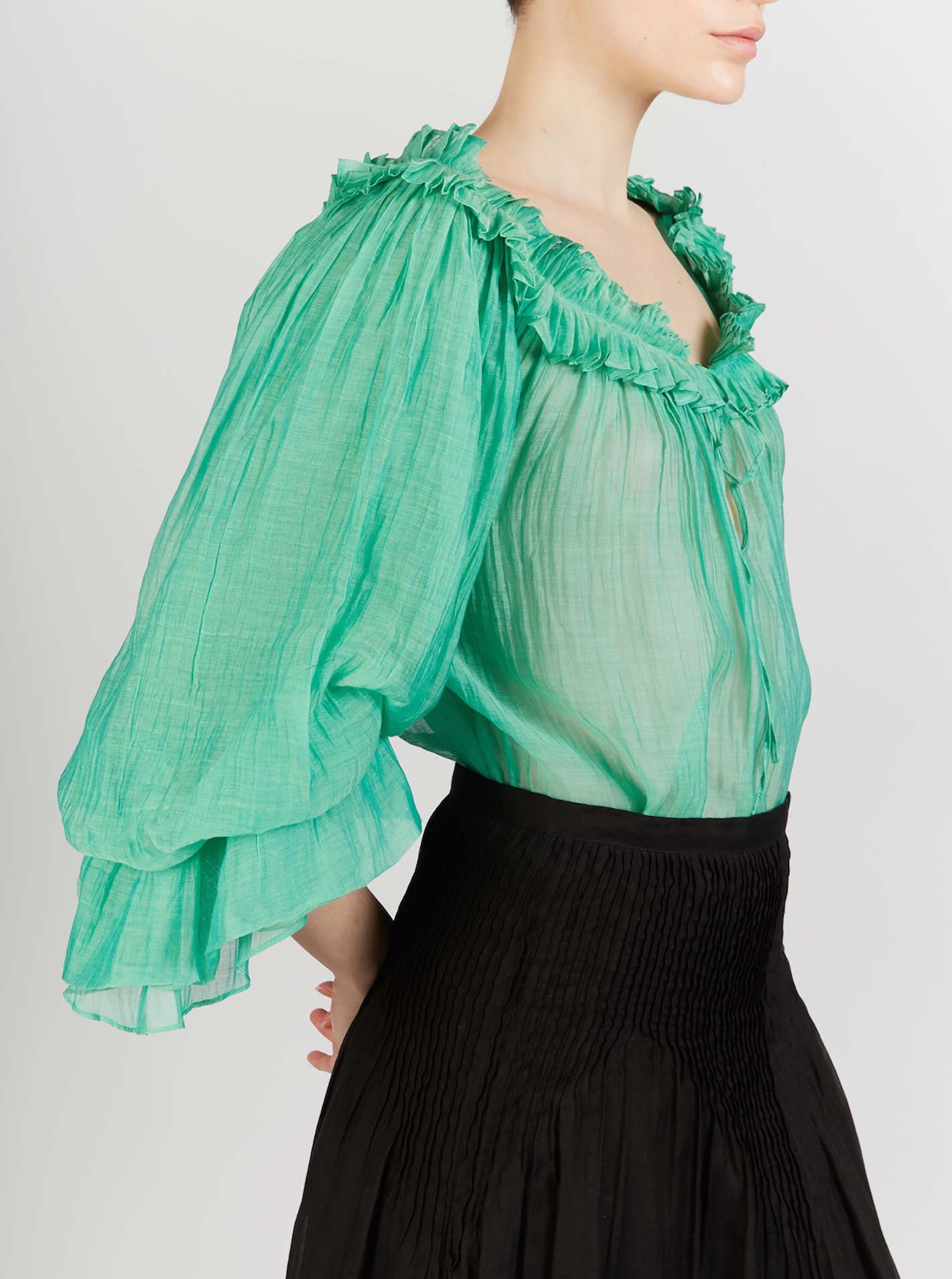 Side view of Roussia Veridian Green Blouse by Thierry Colson
