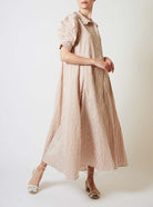 Side view of 'Venetia Dress' - a modern twist on Edwardian style. Crinkle satin, chic, and comfortable by Thierry Colson