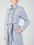 Close up of Wilda Floral Stripes Orange & Blue Shirt Dress by Thierry Colson