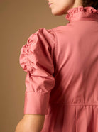 Back sleeve detail of Venetia Plain Poplin Brick Dress by Thierry Colson