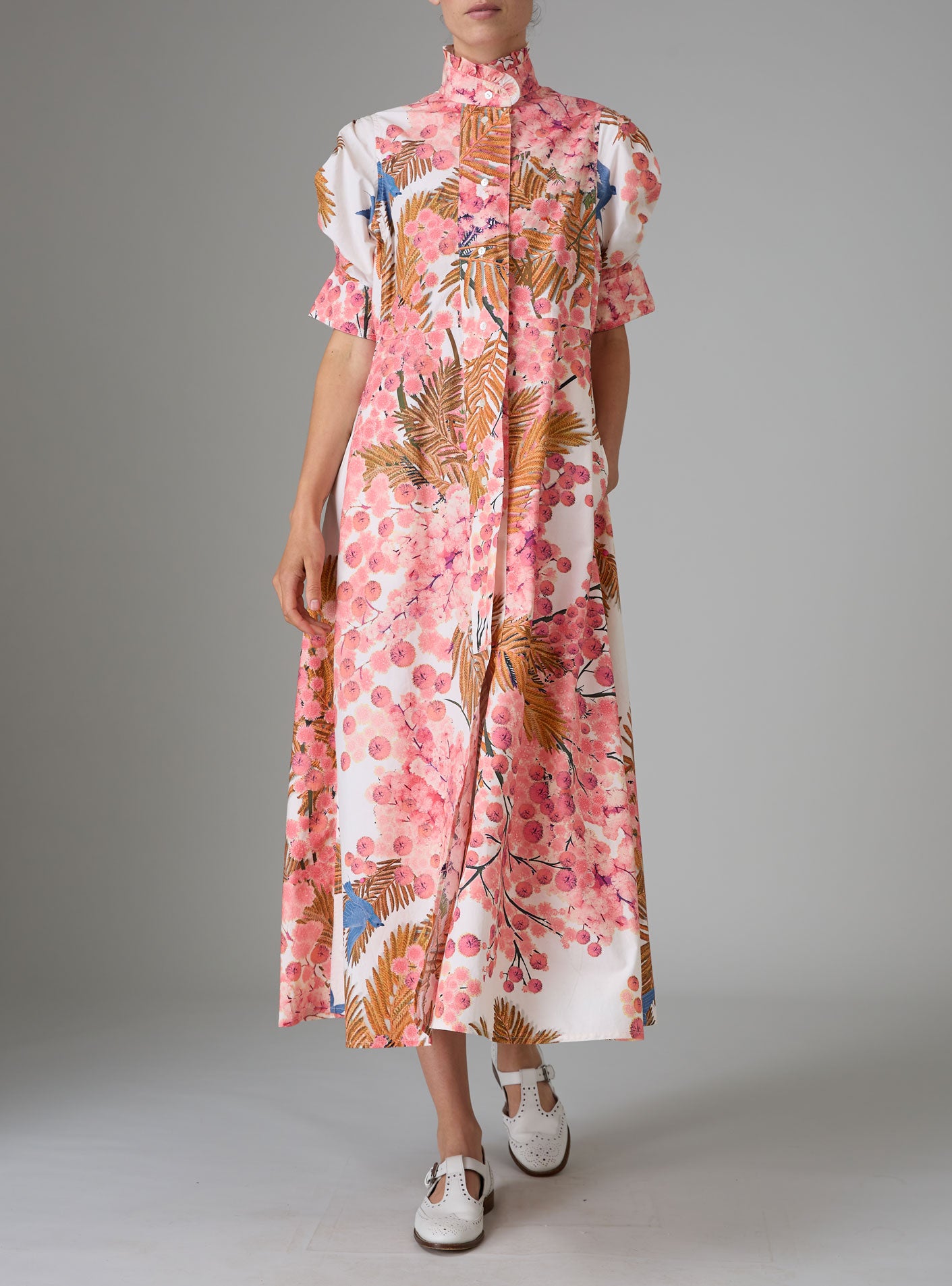 Front view of VENETIA dress with frilled collar and Gigot sleeves, crafted in pink and off-white Italian poplin with Garden of Eden print for Pre-Spring 2025 by Thierry Colson