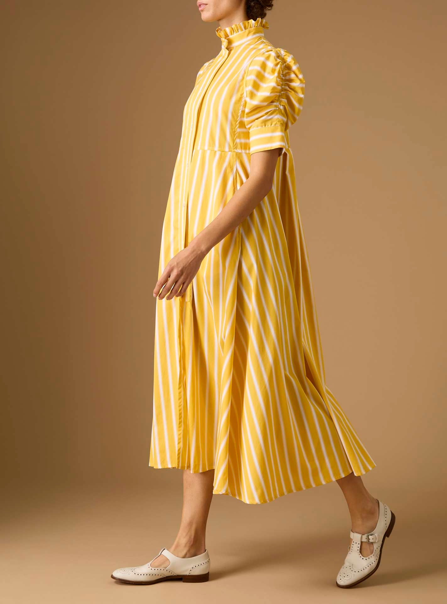 Side view of Venetia Downing Poplin Yellow Dress by Thierry Colson