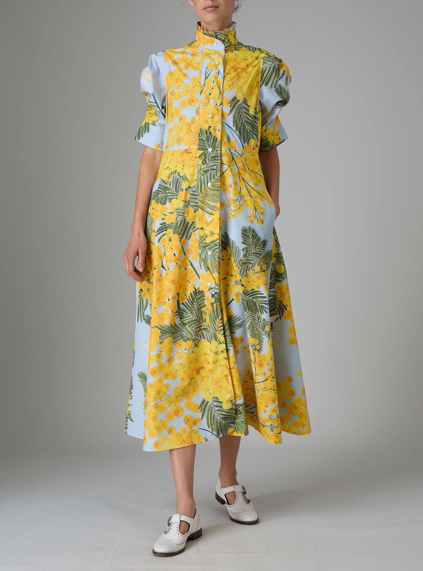 Front view of VENETIA dress in yellow and storm blue with frilled collar and Gigot sleeves by Thierry Colson