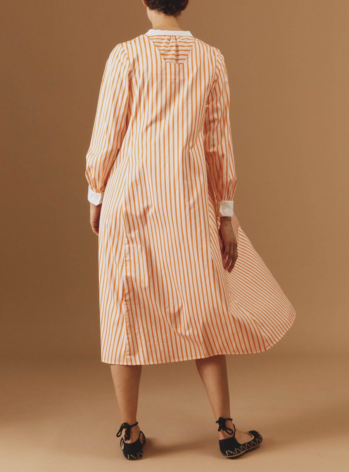 Back view of Victoria Midi stripes Orange/Salmon/White kaftan by Thierry Colson