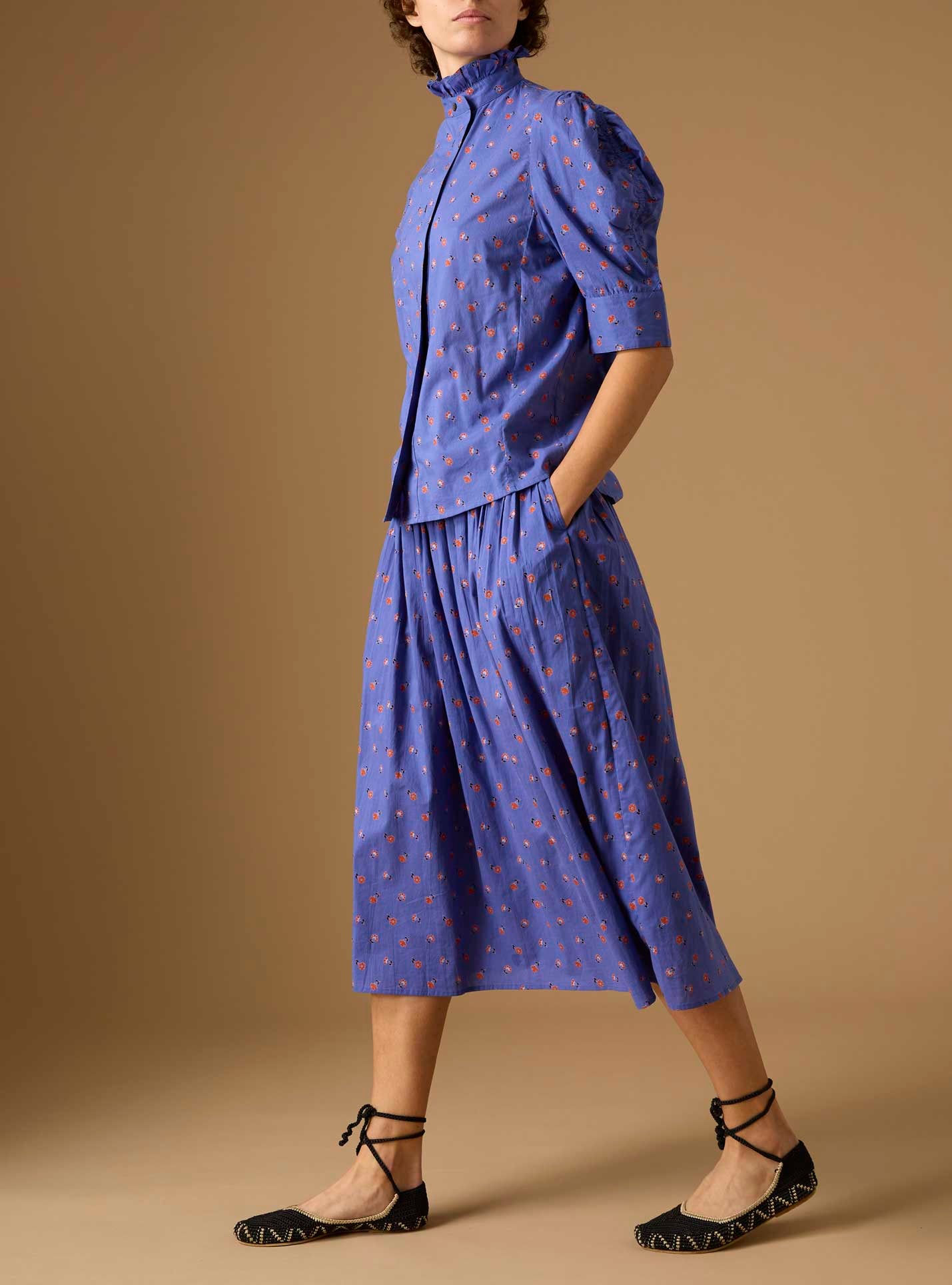 Full side view of Vita blue blouse and Verde blue Skirt from Pre Spring 2024 by Thierry Colson