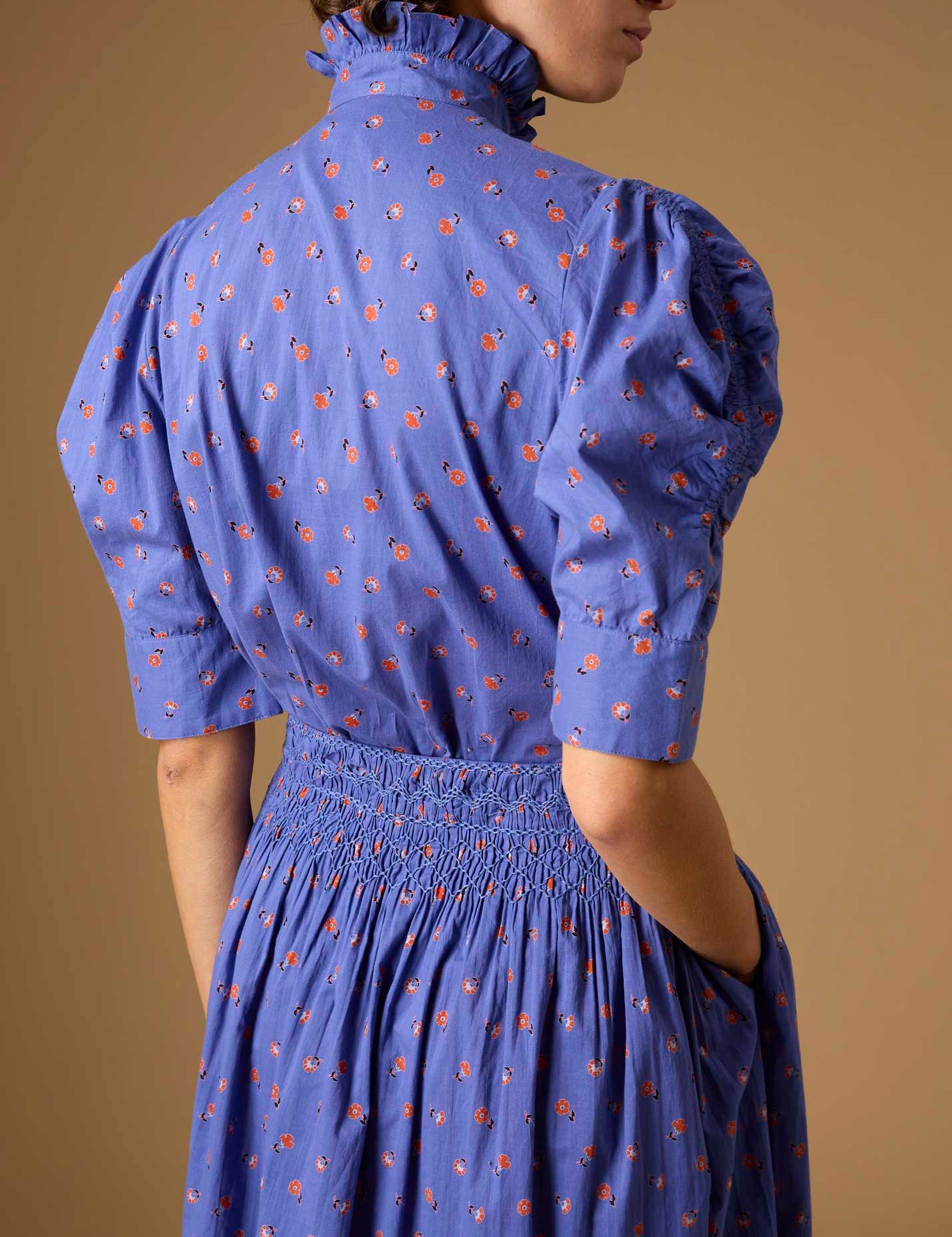 Back detail view of Vita blue blouse Skirt from Pre Spring 2024 by Thierry Colson