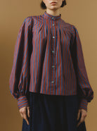 Front view of Yana County Brown Blue Stripes Blouse by Thierry Colson