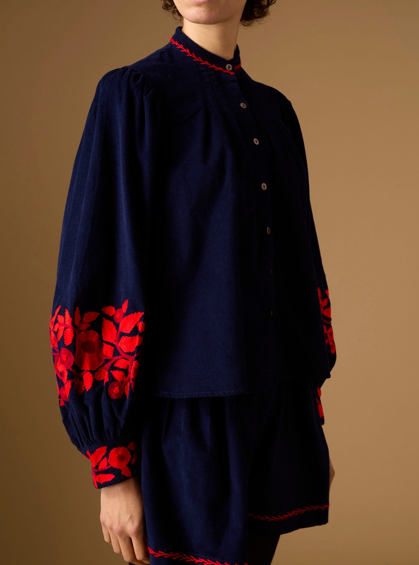 Side view of Yana navy/red Blouse - Embroidered corduroy by Thierry Colson 