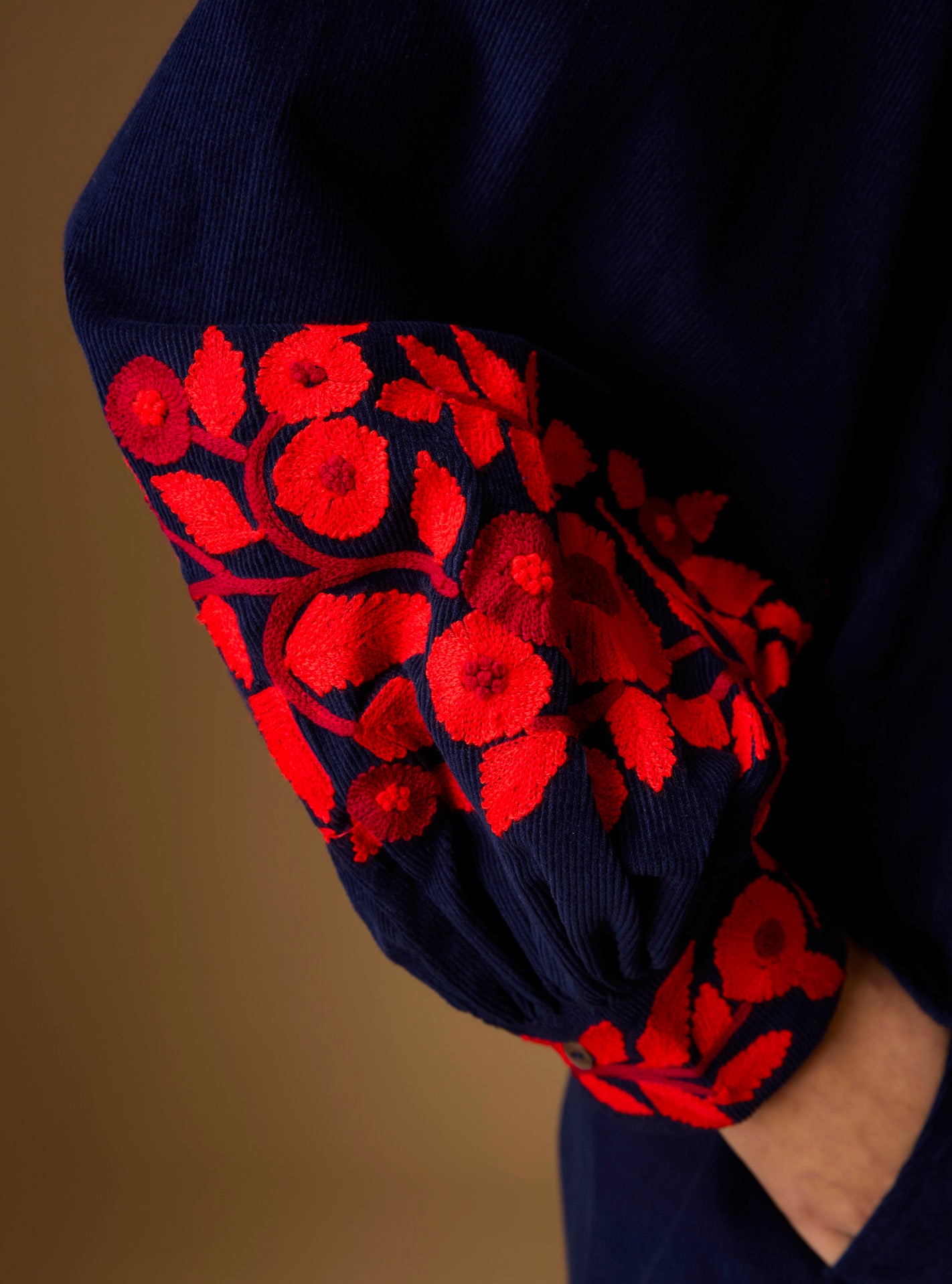 Sleeve detail of Yana navy/red Blouse - Embroidered corduroy by Thierry Colson 