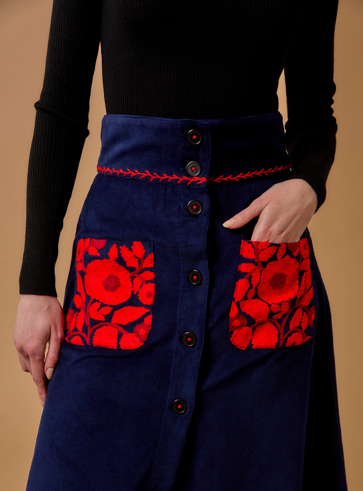 Close-up view of Yardley Navy/Red Skirt - Embroidered Corduroy by Thierry Colson