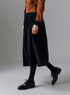 Side view of Zazou skirt black - Tirolean Cord by Thierry Colson