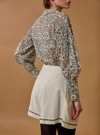 Back view of Zlata Black Blouse - Paper Cut Print by Thierry Colson