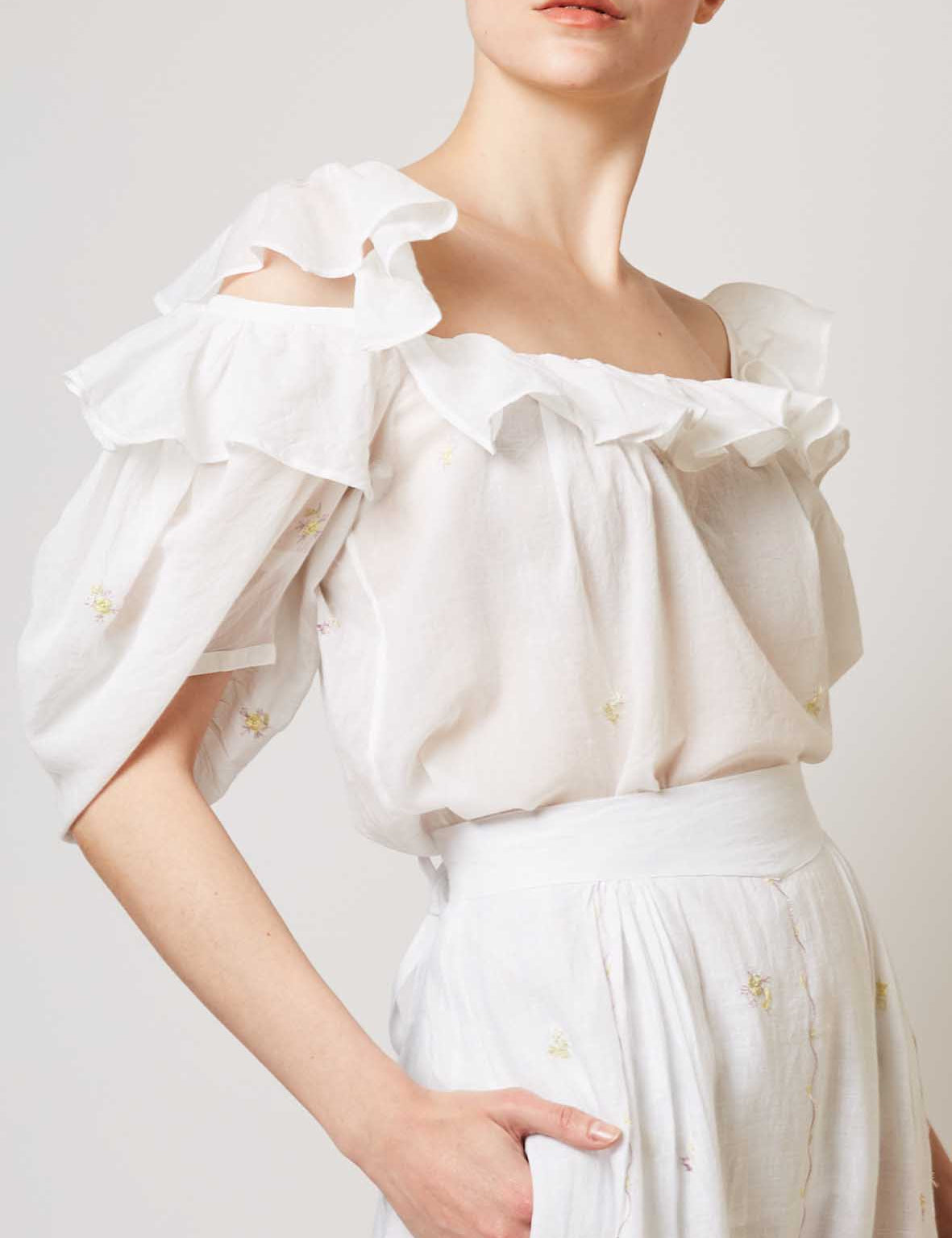 Side view of Venus boudoir white blouse by Thierry Colson 
