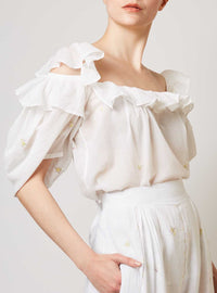 Side view of Venus boudoir white blouse by Thierry Colson