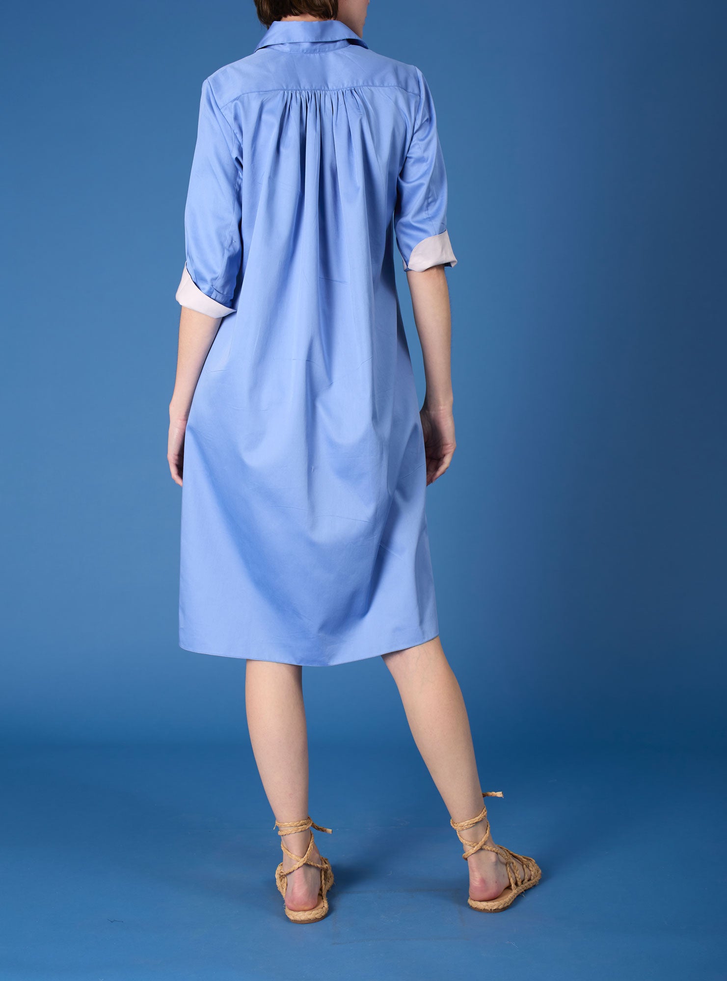 Back view of Angelica blue "Pervenche" shirt dress by Thierry Colson