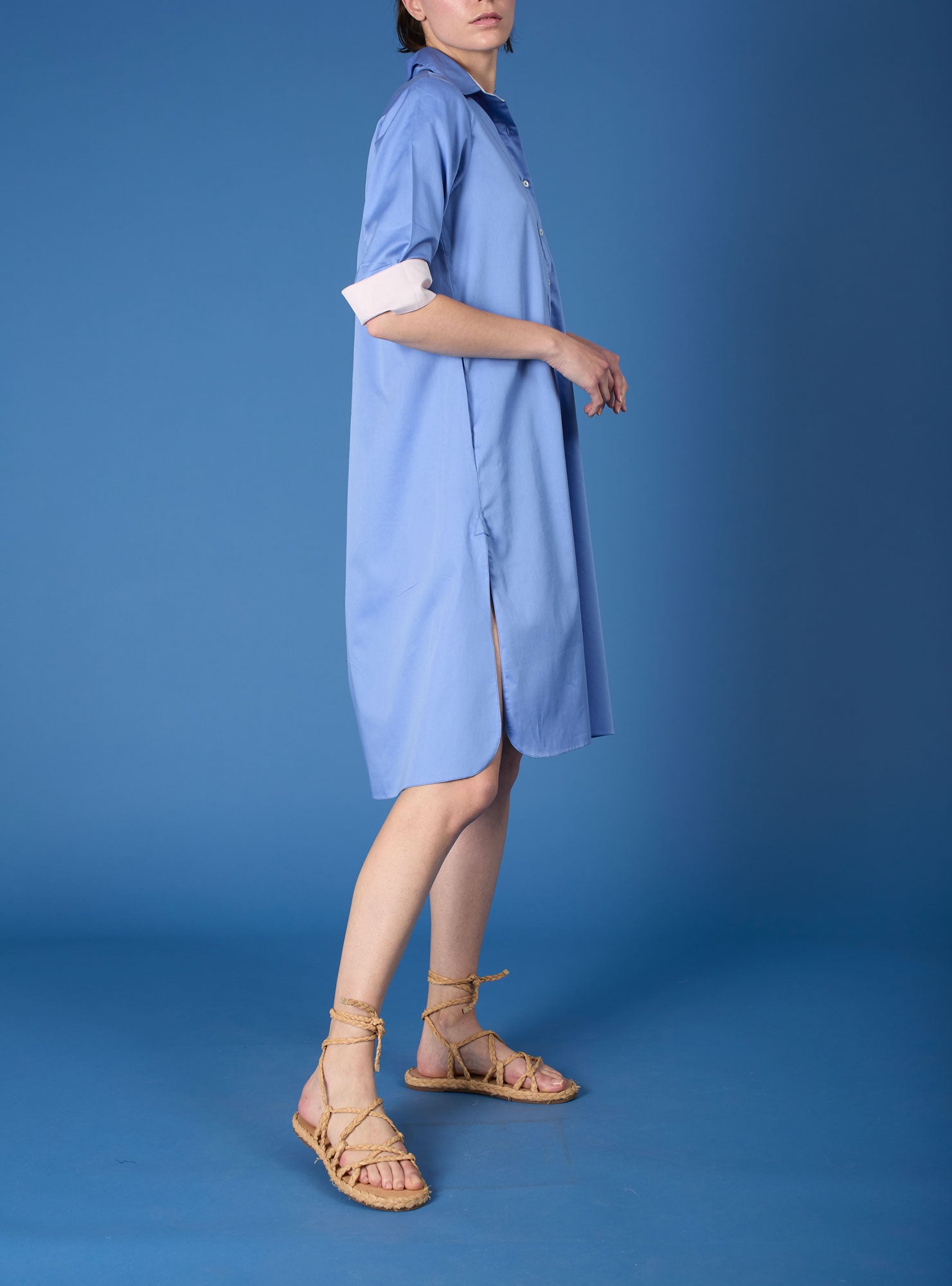Side view of Angelica blue "Pervenche" shirt dress by Thierry Colson
