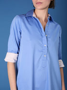 Close up of Angelica blue "Pervenche" shirt dress by Thierry Colson