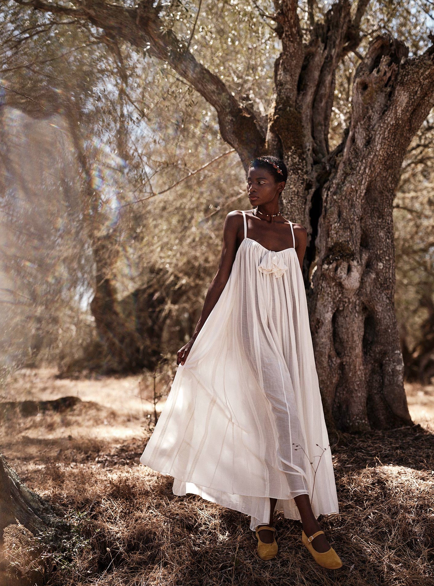 Photography by Stéphane Gautronneau - Zenobia Optical Pleats Off White long dress by Thierry Colson