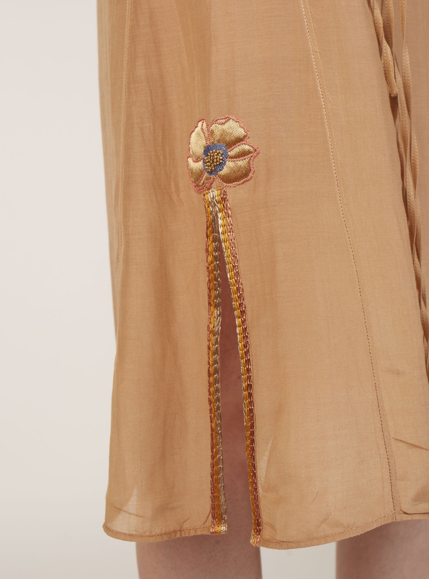 Bottom detail of Betty Sand Rose Long Dress by Thierry Colson