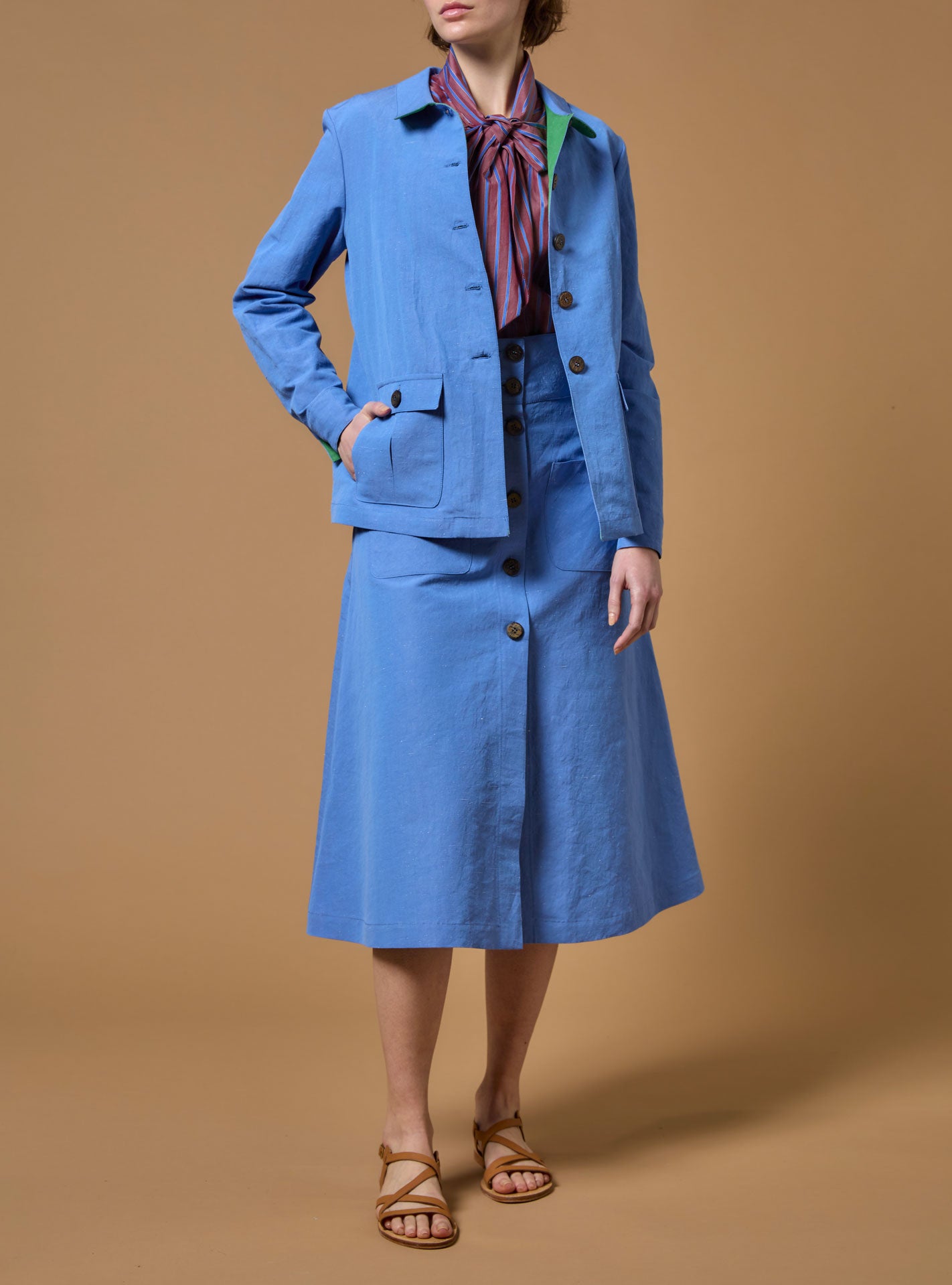 Front view of Khan Blue lining Grass Jacket with Yardley Skirt  by Thierry Colson PS23