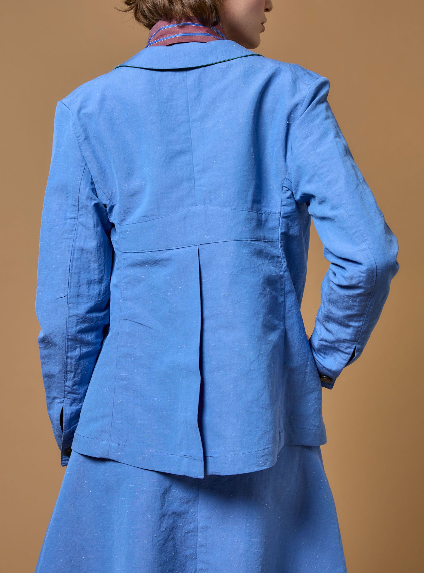 Back view of Khan Blue lining Grass Jacket by Thierry Colson PS23
