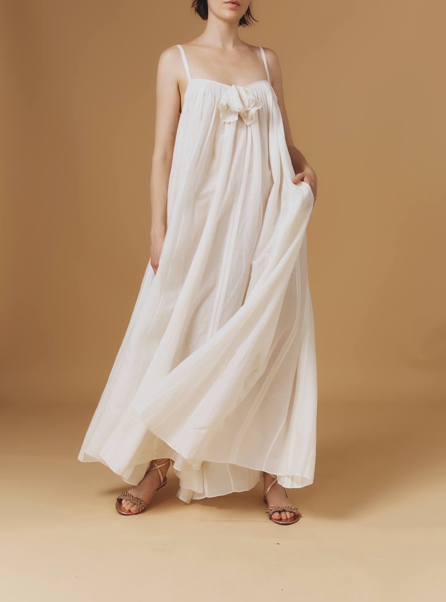 Zenobia Optical Pleats Off White long dress by Thierry Colson