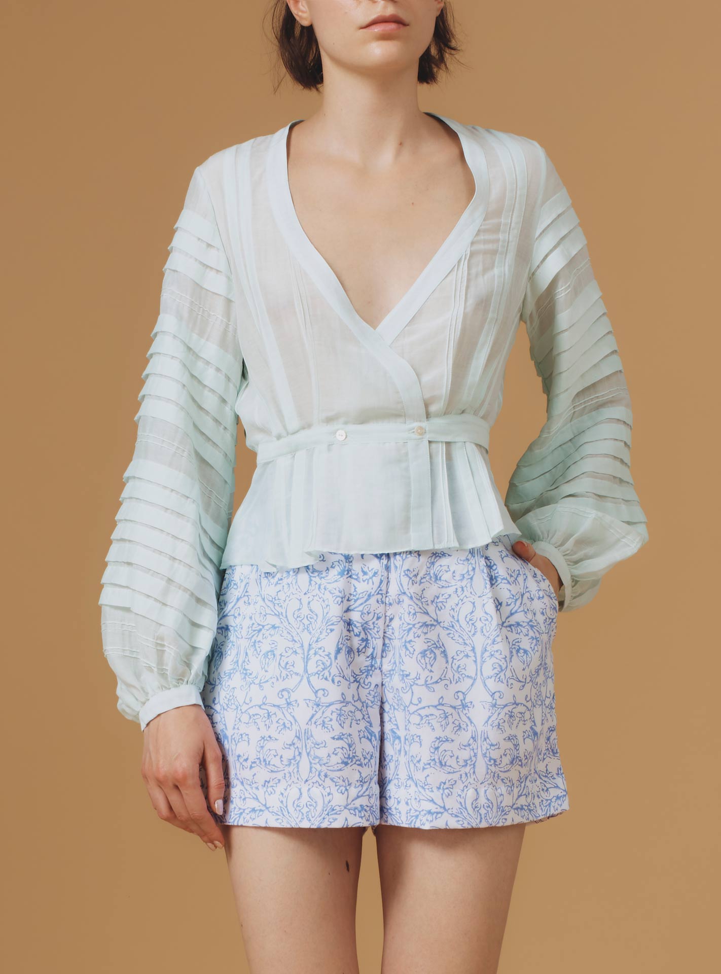 Zoran Optical Pleats Mint Blouse by Thierry Colson