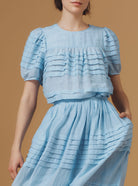 Close Up Front View Olympia Heaven Blue Top - Optical Pleats - Thierry Colson
