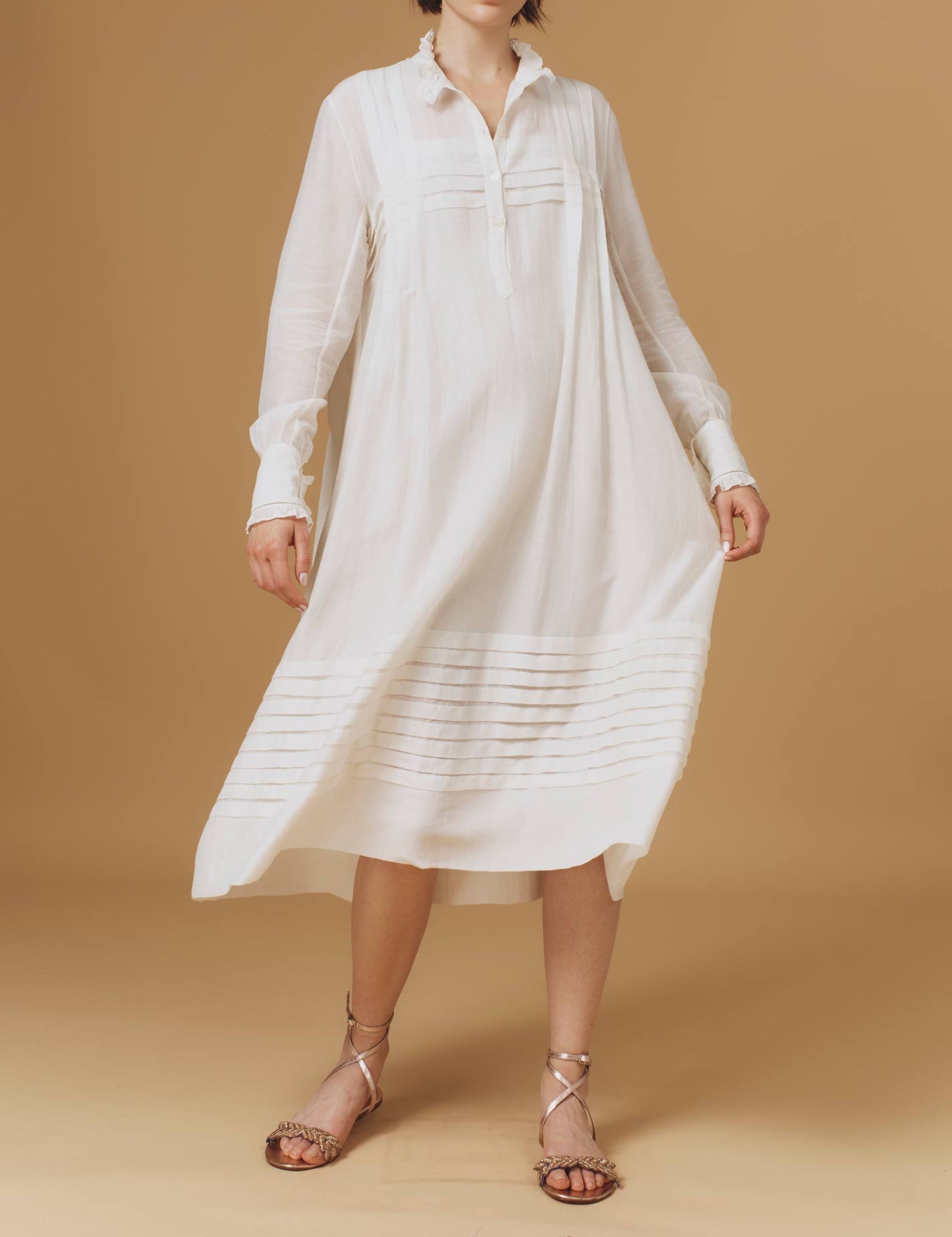 Front view of Zita Optical Pleats Off White dress by Thierry Colson