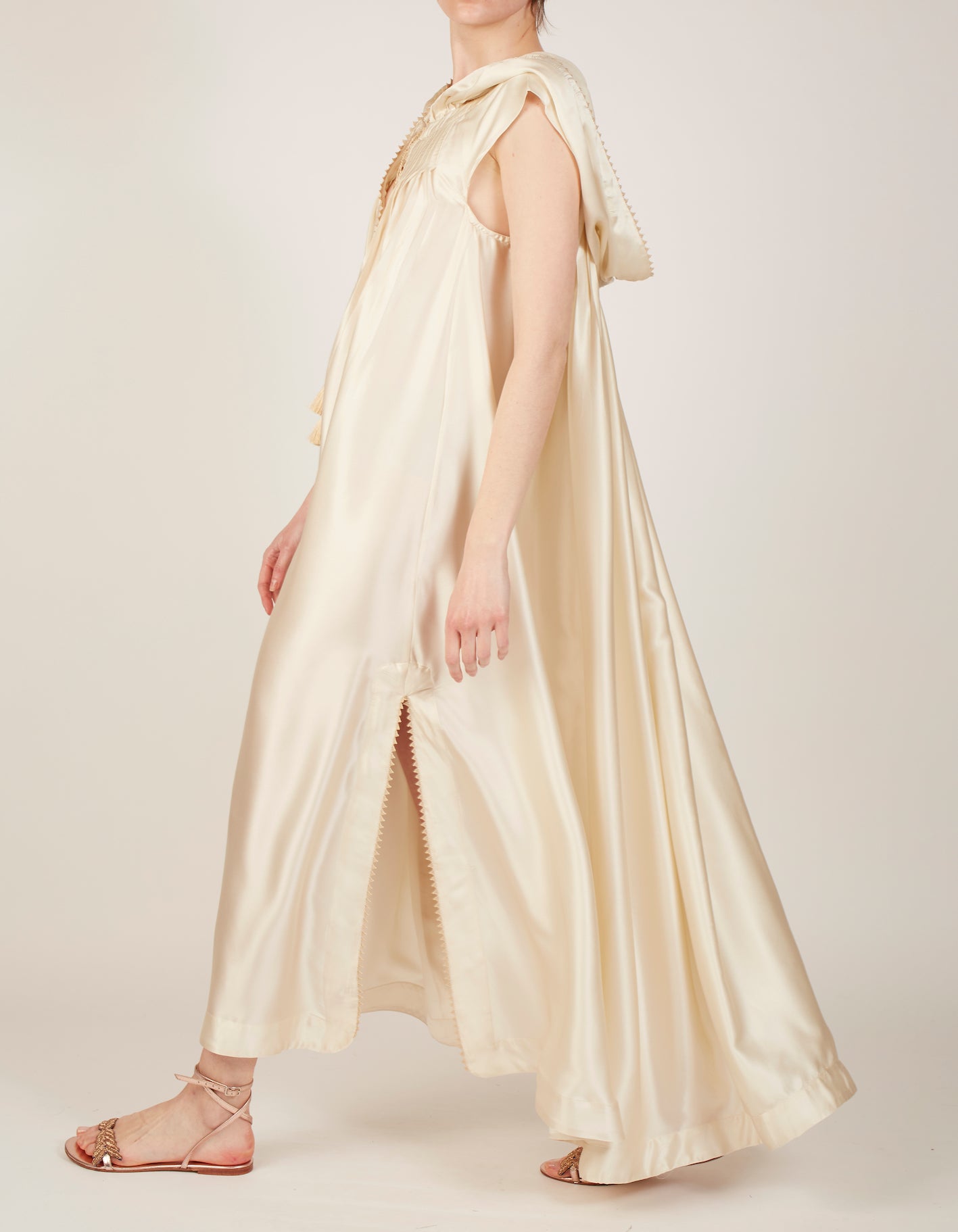 Side view of Eden Ivory Silk Kaftan by Thierry Colson