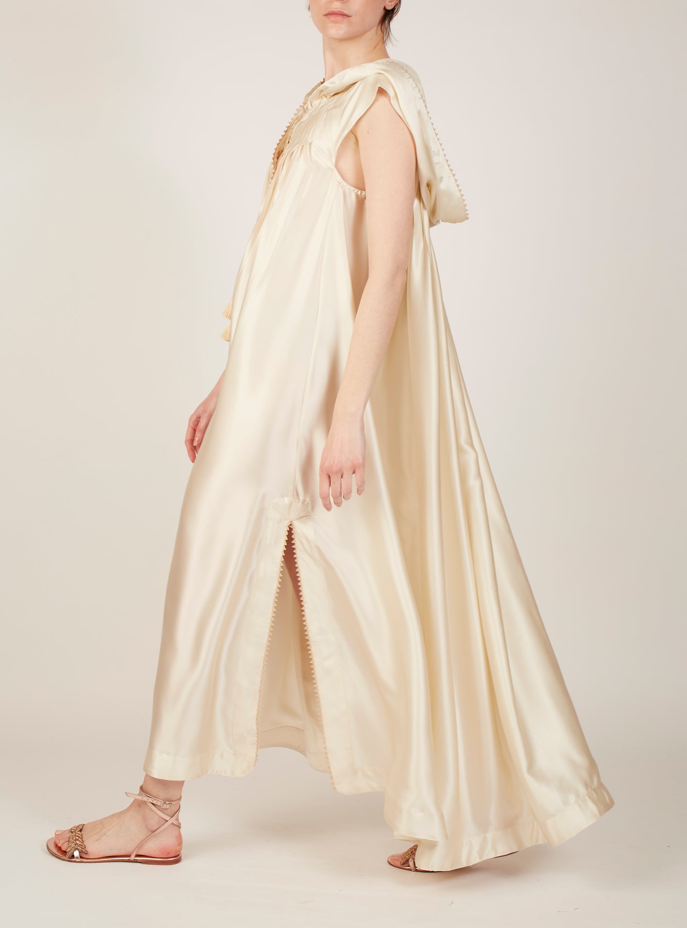 Side view of Eden Ivory Silk Kaftan by Thierry Colson