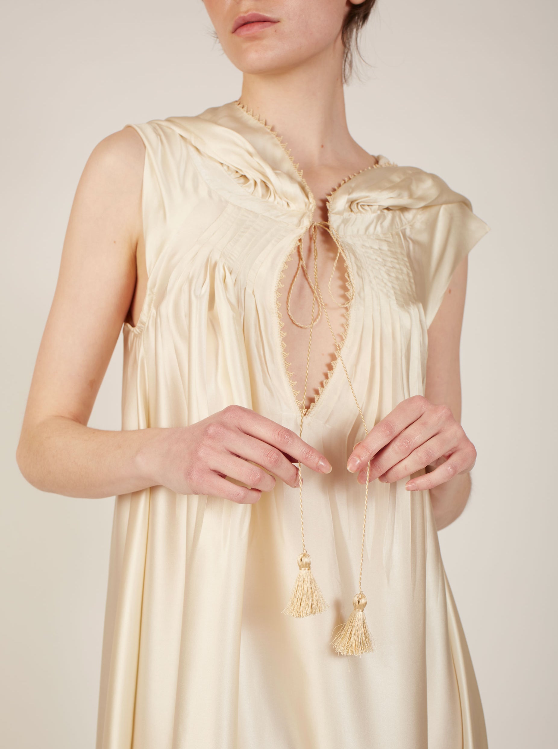 Detail front view of Eden Ivory Silk Kaftan by Thierry Colson