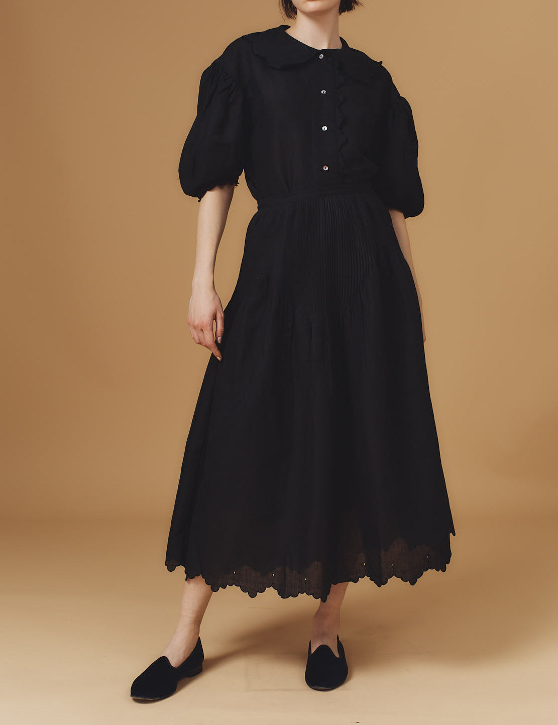 Front view of Vanina Barocco Scallops Black  Blouse with Verde Skirt by Thierry Colson