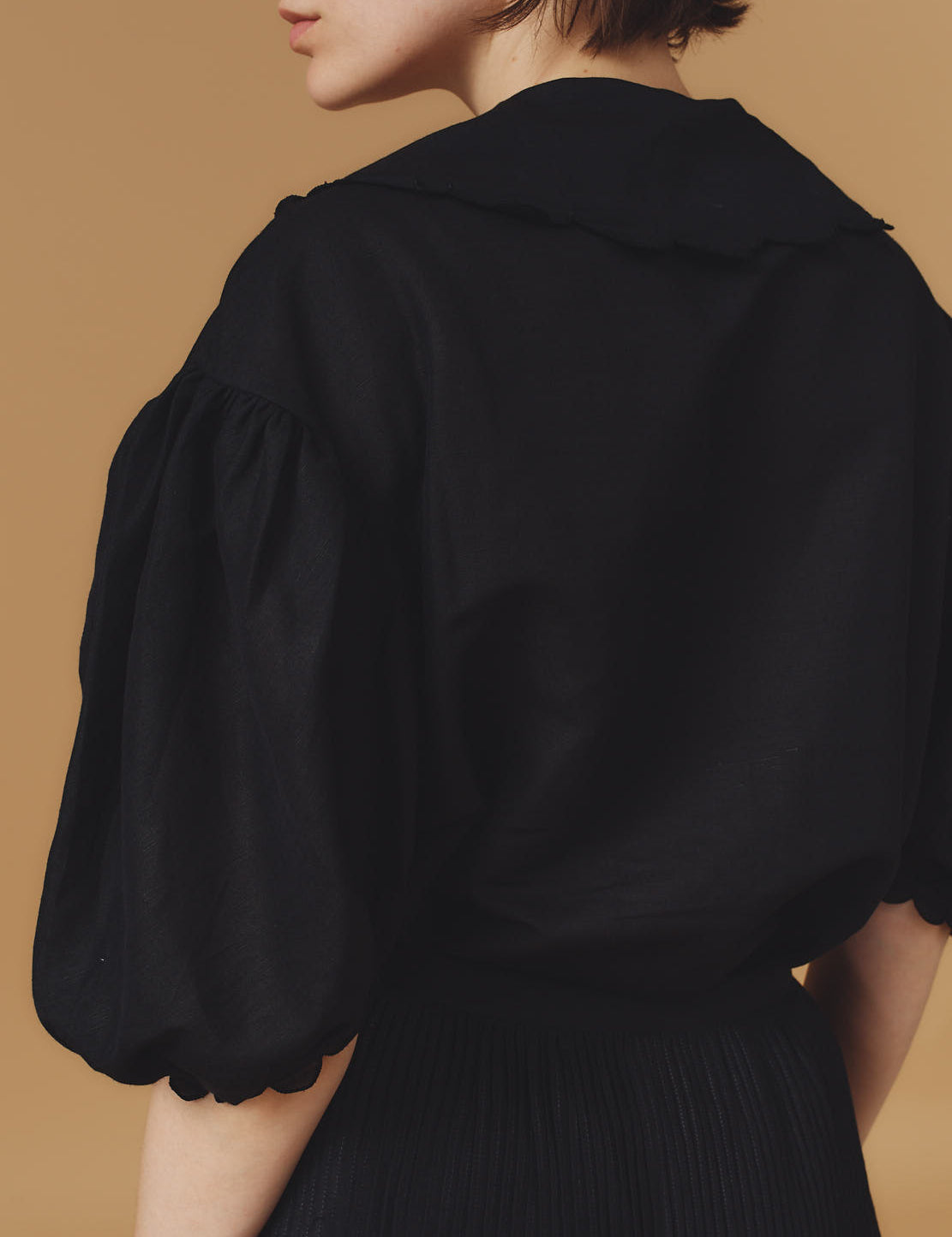 Back view of Vanina Barocco Scallops Black  Blouse by Thierry Colson