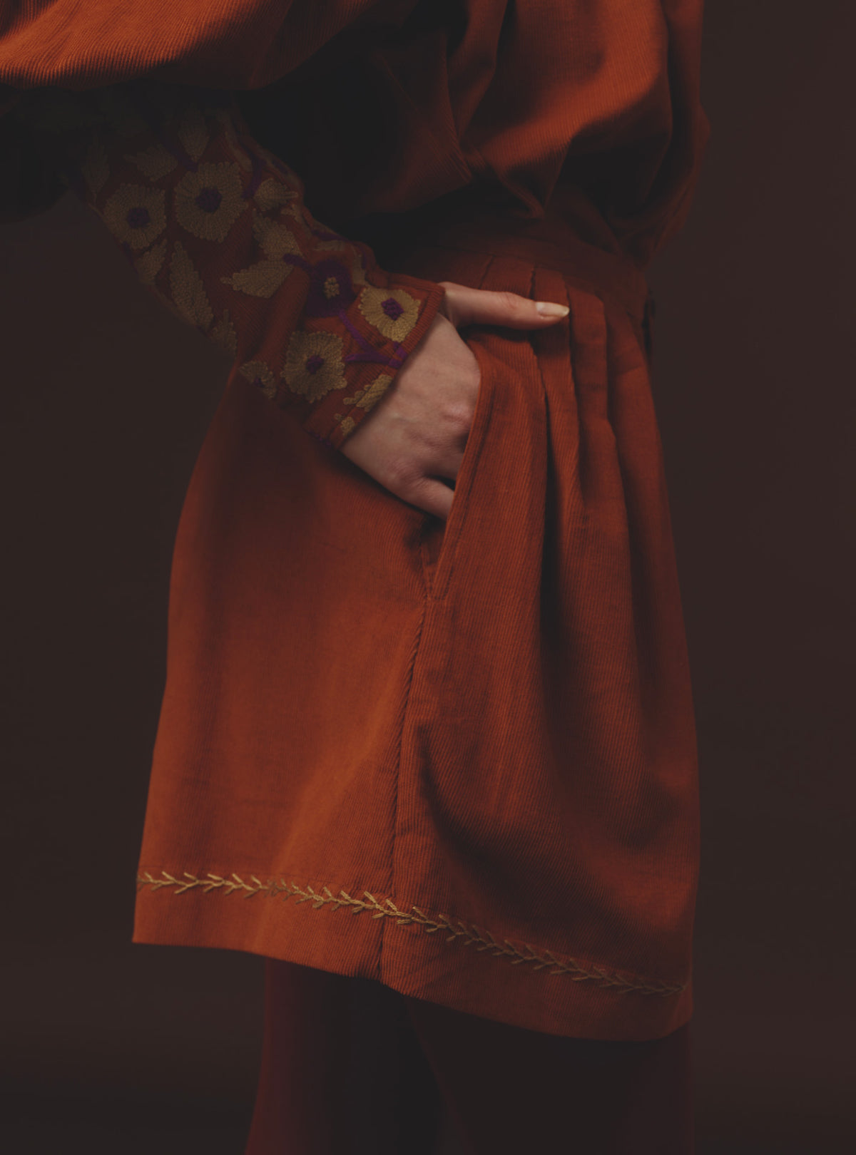 Detail side view Kenya Burnt Orange Short by Thierry Colson