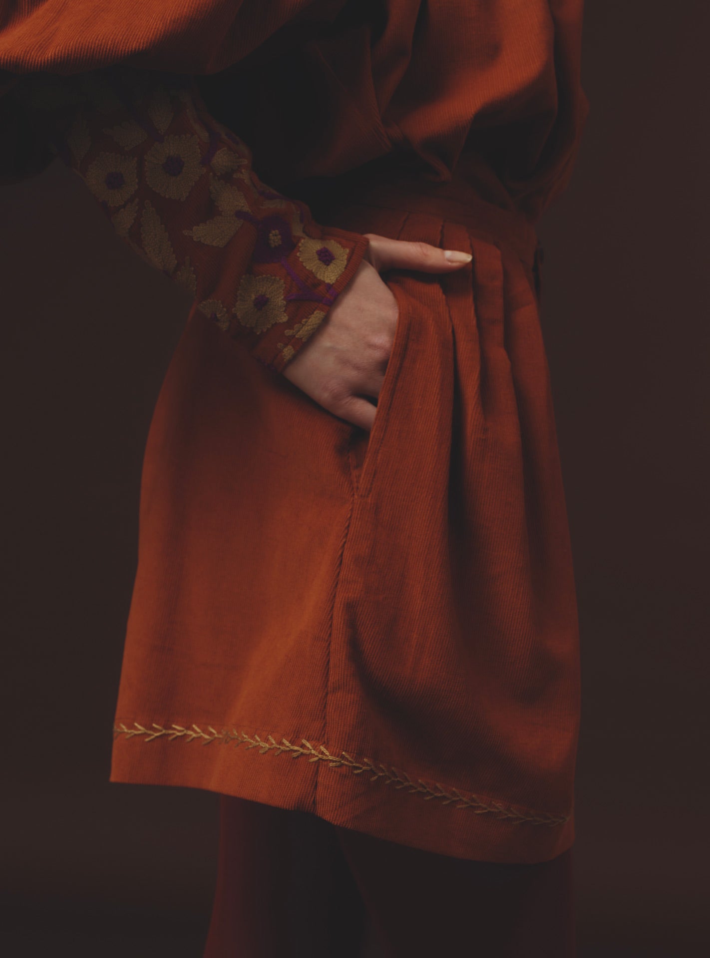 Detail side view Kenya Burnt Orange Short by Thierry Colson