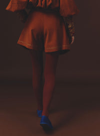 Back view Kenya Burnt Orange Short by Thierry Colson