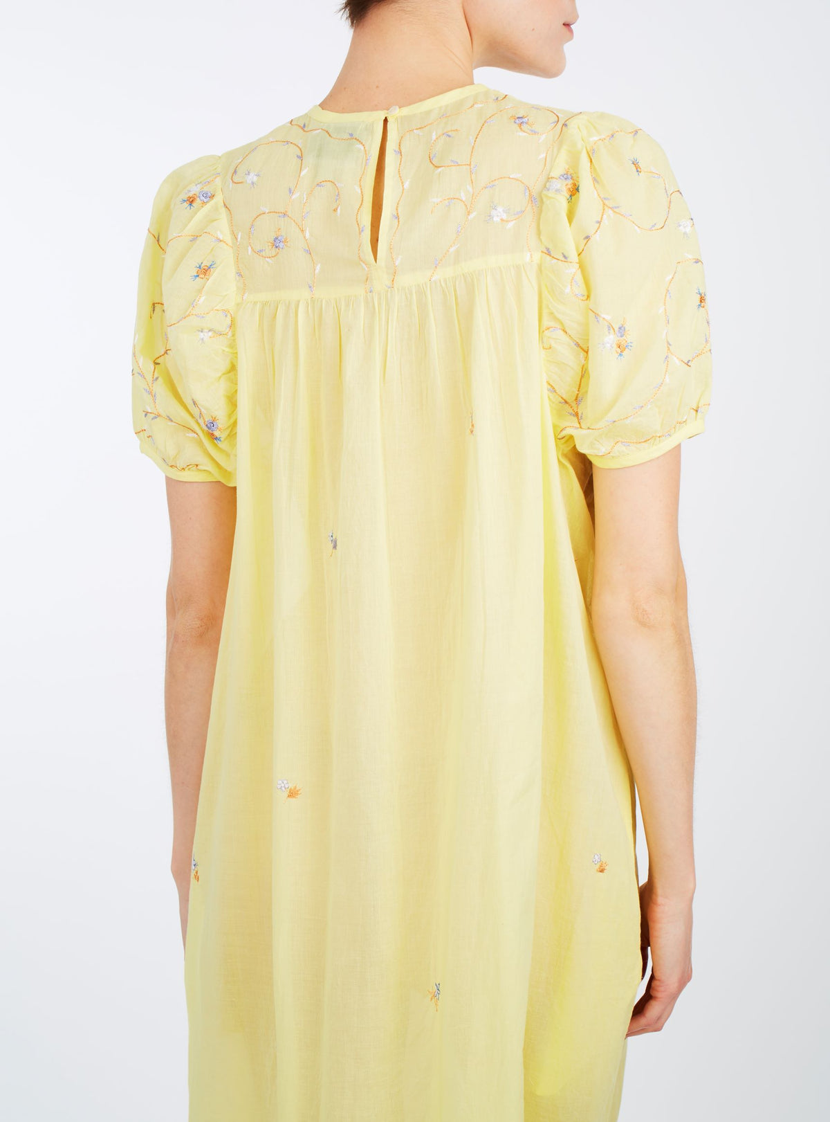 Close up back view of Olympia Sweet Lemon cotton Dress by Thierry Colson