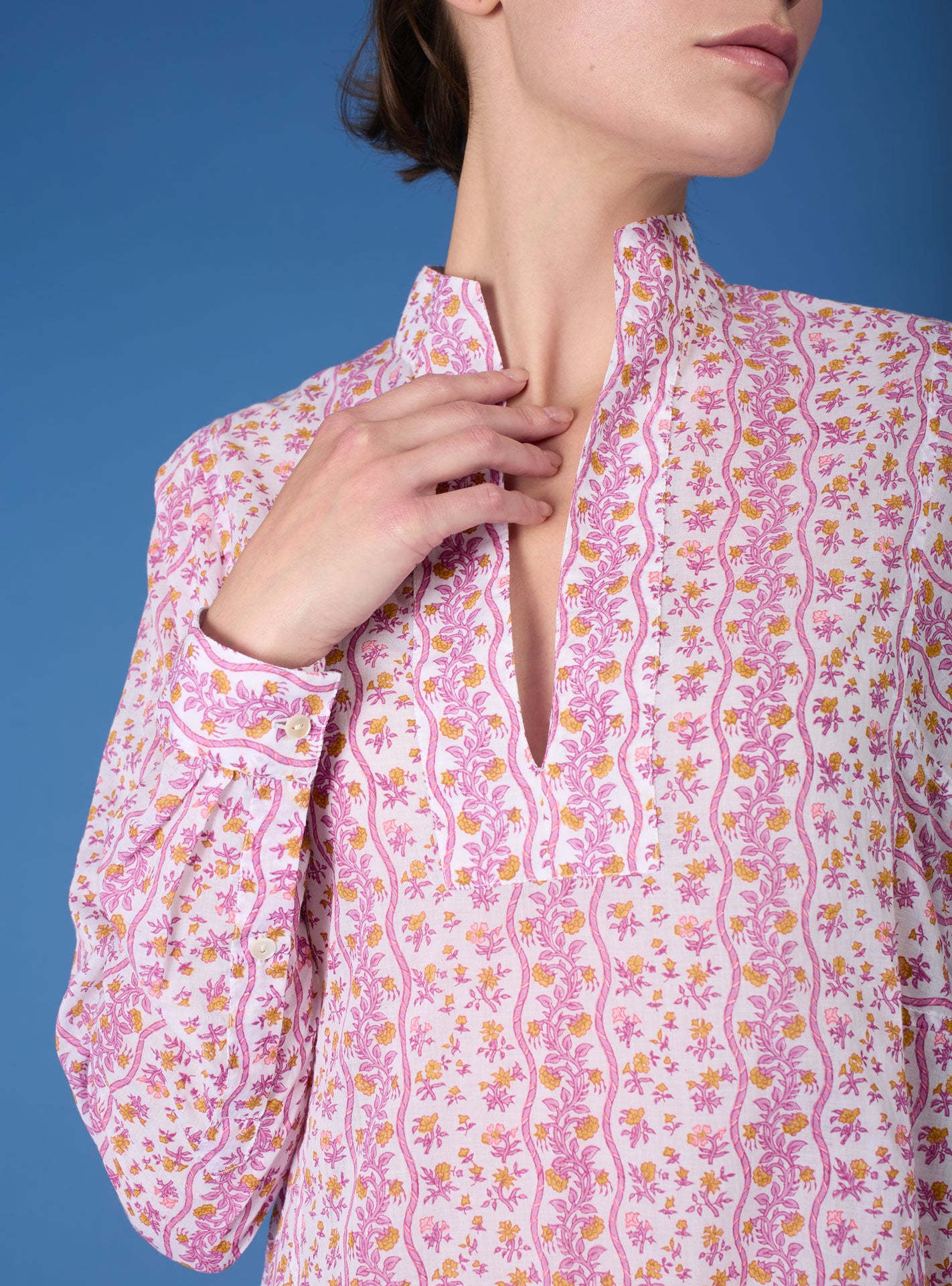 Close up view of Parvati Cyclamen Mustard long Kaftan by Thierry Colson