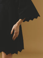 Close up sleeve view Rachel black mini Kaftan by Thierry Colson - Barocco Scallops theme